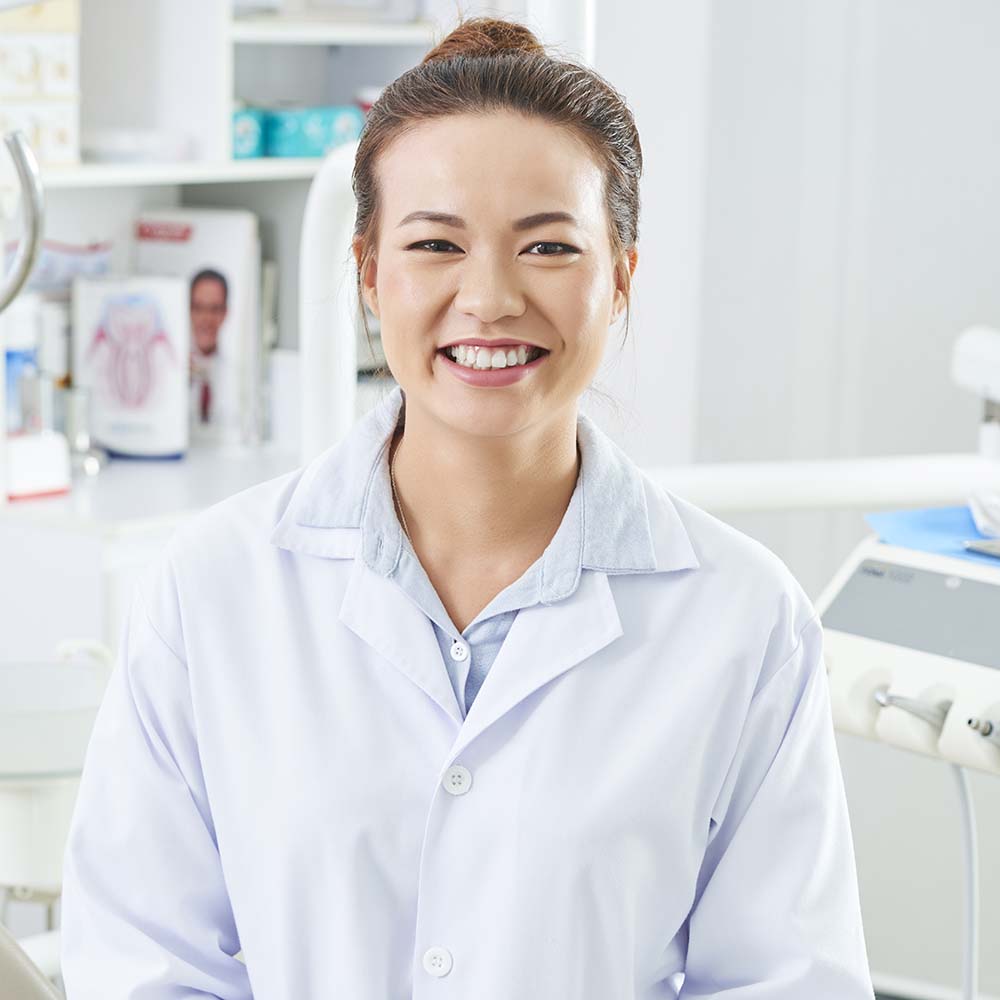 beautiful-female-dentist-portrait-VVA6T8L